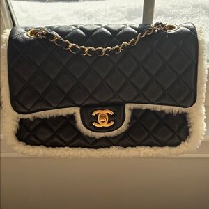 Chanel Black shearling lined Quilted Bag w hand muff on back